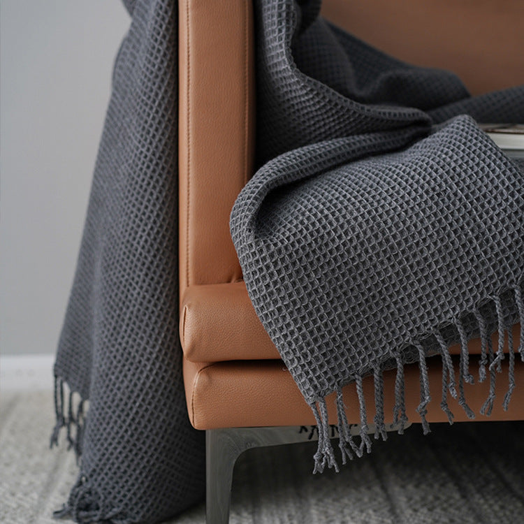 Elegant dark grey blanket for sofa and decoration in model room