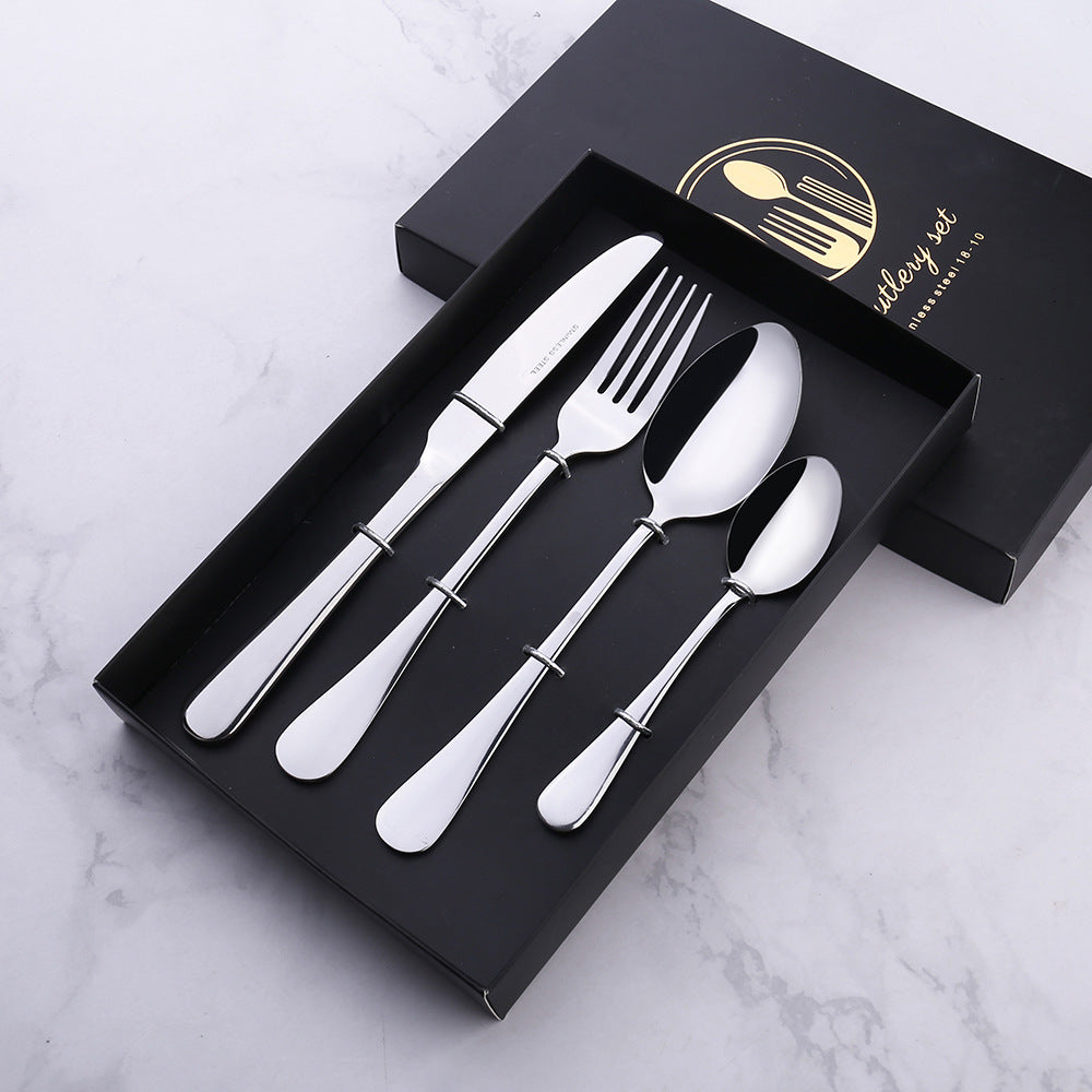 Four pieces of stainless steel cutlery