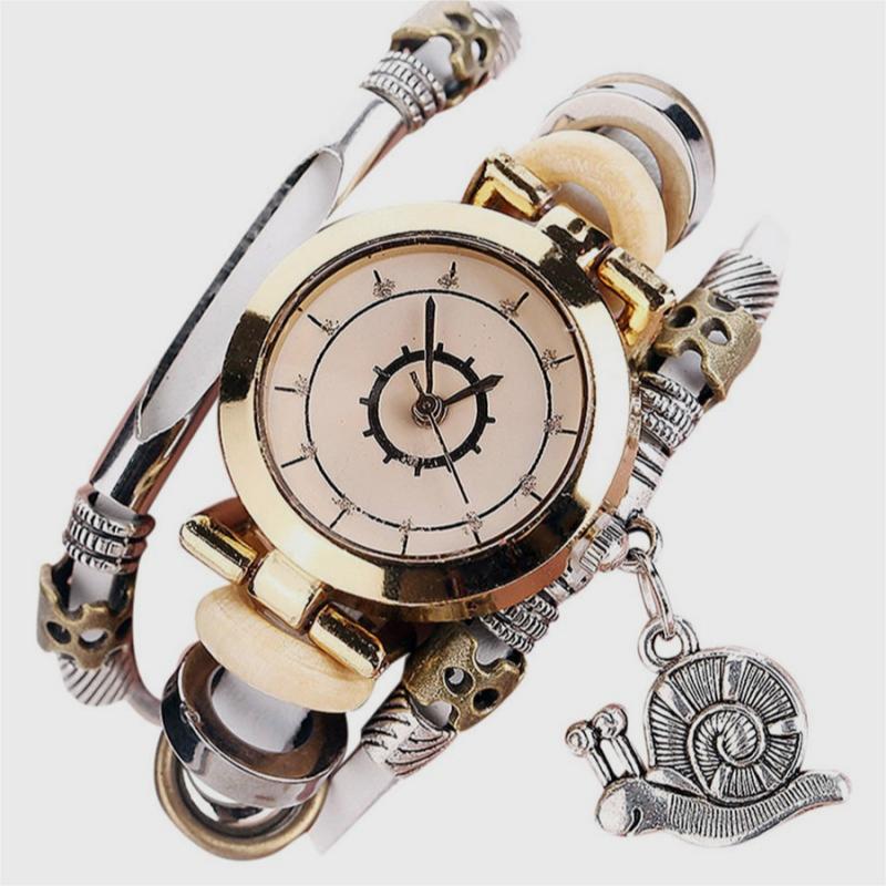 Vintage style women's watch with wristwatch, leather strap and snail pendant